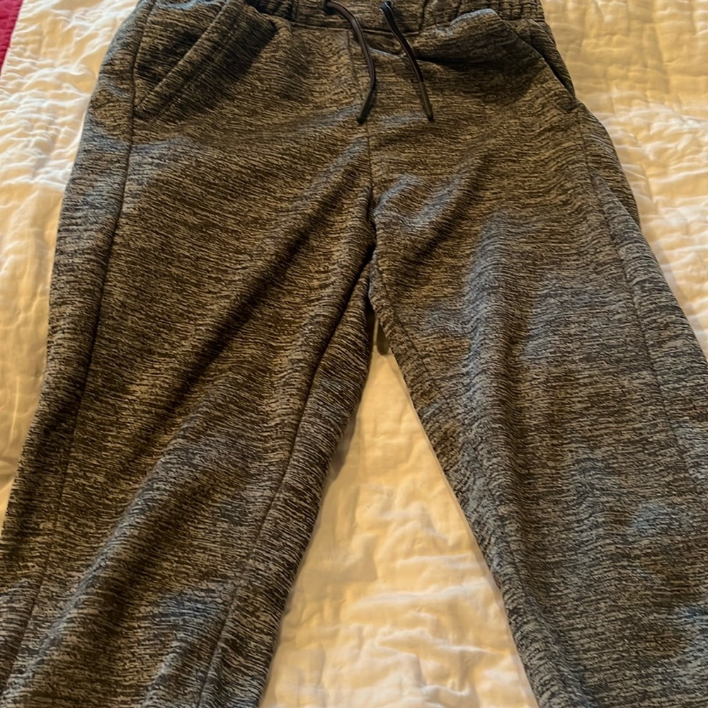 Comfortable, like new boy’s sweatpants with elastic/ string wait.